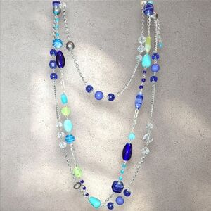 Two glass swirl beaded silvertone necklaces blue green yellow